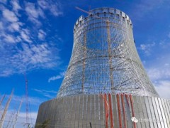 新疆华电哈密热电公司四期2×350MW工程钢结构间冷塔顺利结顶